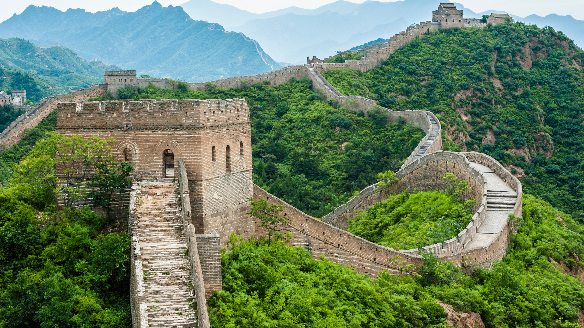 A breathtaking view of the Great Wall of China stretching over the mountains – a must-visit destination in this Great Wall of China travel guide