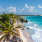 "Scenic view of a beach with ancient Mayan ruins in Tulum, Mexico – A must-visit destination in this Tulum travel guide."