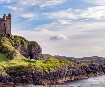 A stunning castle on Scotland’s rugged coastline, showcasing historic architecture and breathtaking ocean views.