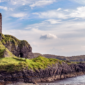 A stunning castle on Scotland’s rugged coastline, showcasing historic architecture and breathtaking ocean views.